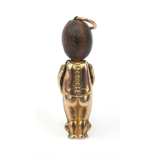 381 - Military interest gold coloured metal 'Fumsup' doll, 3cm high