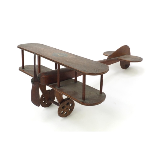 397 - Military interest wooden biplane with the Gloucester Aircraft Co Ltd emblems, 35cm long