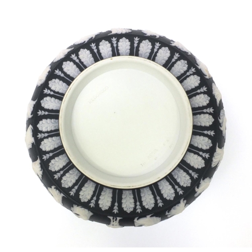 610 - Wedgwood black jasperware dancing hours pattern bowl, factory marks to the base, 26cm diameter