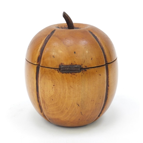 65 - Fruit wood tea caddy in the form of an apple, 13cm high