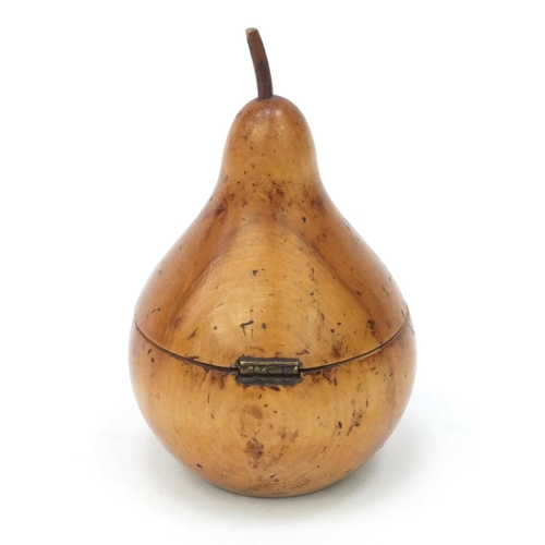 64 - Fruit wood tea caddy in the form of a pear, 14cm high