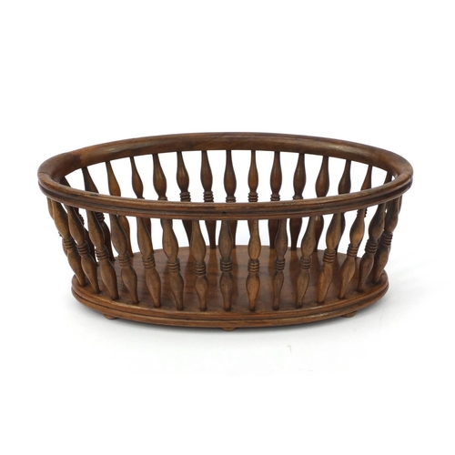 69 - Victorian walnut bread basket with turned spindles, 11cm high