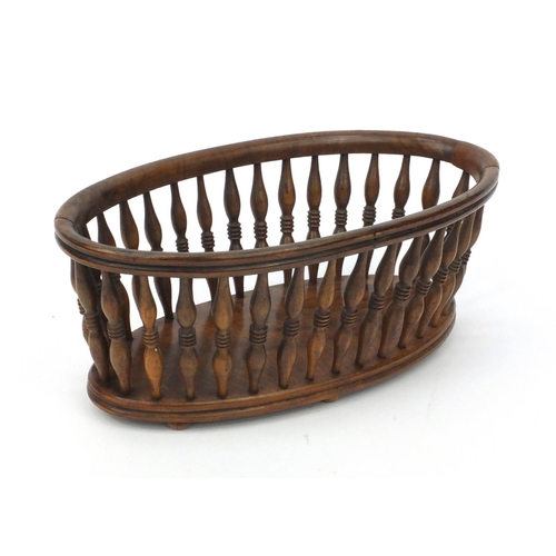 69 - Victorian walnut bread basket with turned spindles, 11cm high