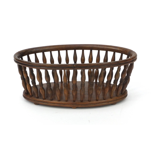 69 - Victorian walnut bread basket with turned spindles, 11cm high