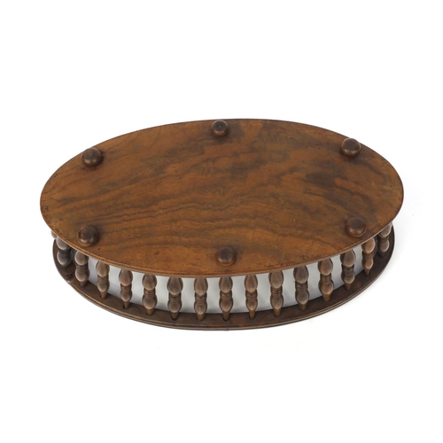 69 - Victorian walnut bread basket with turned spindles, 11cm high