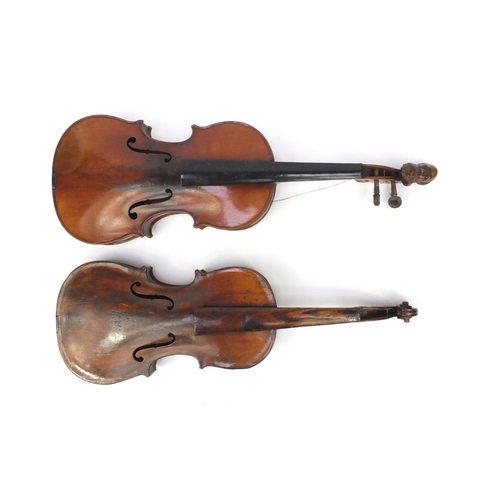 349 - Two old wooden violins, one with figural scroll and Gaspard duiffo Praggard label, the other with an... 