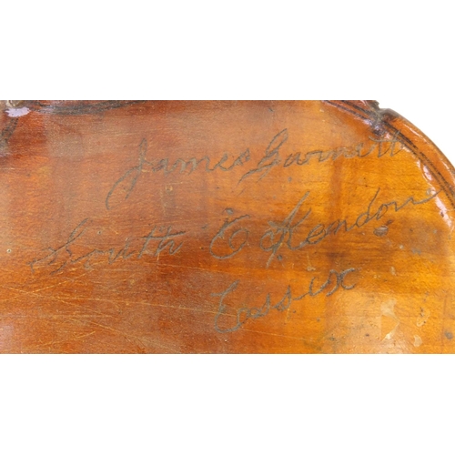 349 - Two old wooden violins, one with figural scroll and Gaspard duiffo Praggard label, the other with an... 