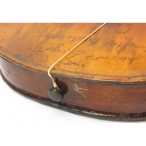 349 - Two old wooden violins, one with figural scroll and Gaspard duiffo Praggard label, the other with an... 