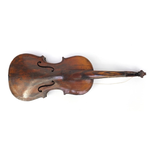 349 - Two old wooden violins, one with figural scroll and Gaspard duiffo Praggard label, the other with an... 