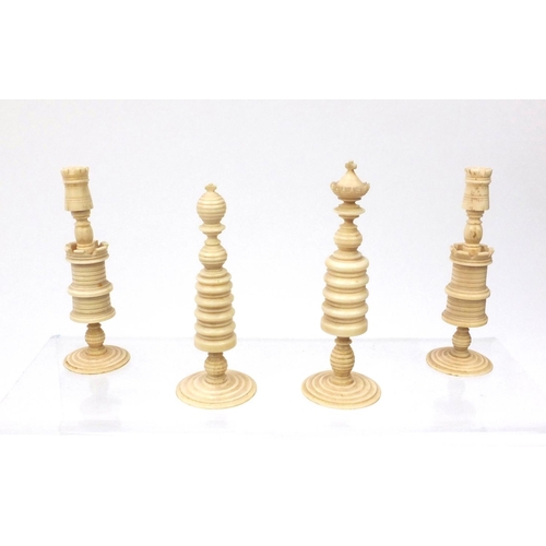 411 - **DESCRIPTION AMENDED 6/9** Half stained turned ivory part chess set with chess board, the tallest p... 