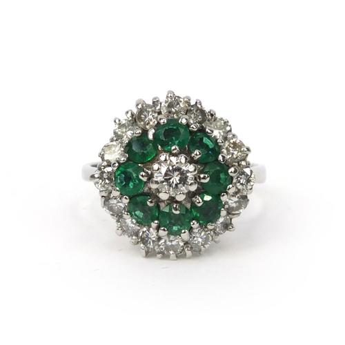 848 - 18ct white gold emerald and diamond cluster ring, size M, approximate weight 5.6g