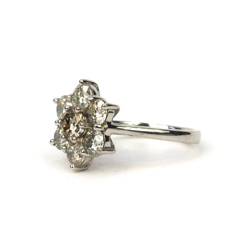 840 - 18ct white gold brilliant cut diamond flower head ring, size N, approximate weight 5.2g