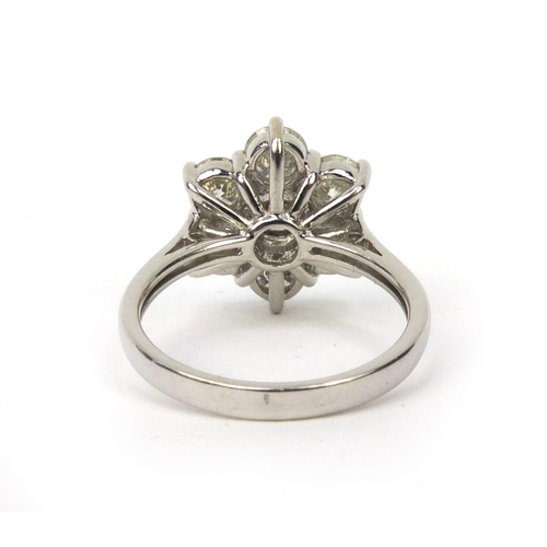 840 - 18ct white gold brilliant cut diamond flower head ring, size N, approximate weight 5.2g