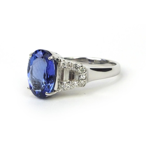 816 - 18ct white gold tanzanite and diamond ring, size N, approximate weight 5.2g