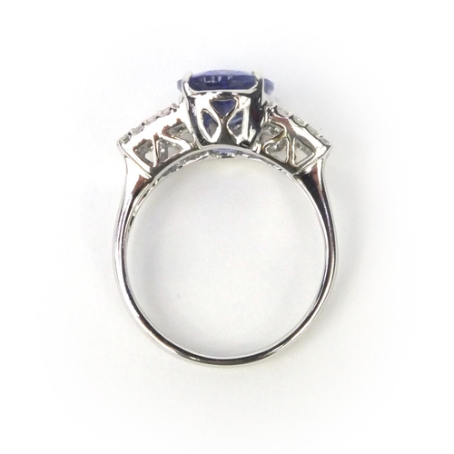 816 - 18ct white gold tanzanite and diamond ring, size N, approximate weight 5.2g