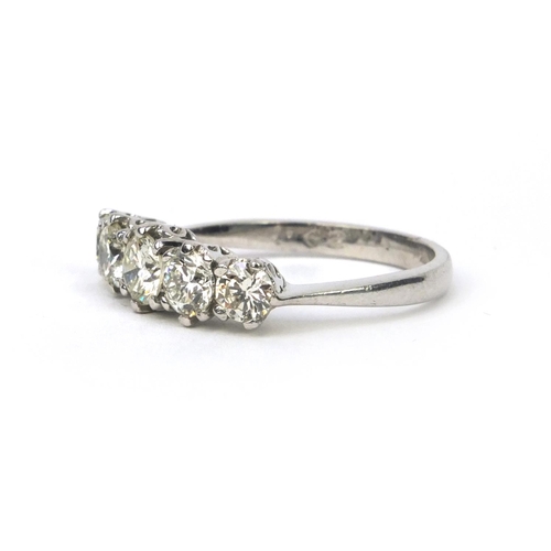 828 - 18ct gold five stone brilliant cut diamond ring, size N, approximate weight 3.8g