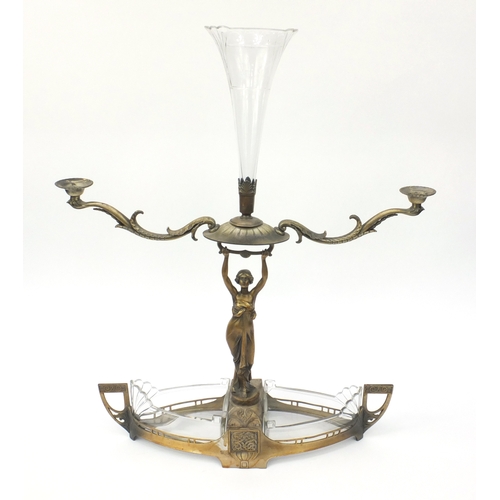 632 - Large WMF silver plated figural centre piece with glass trumpet shaped vase and two candelabras, fac... 