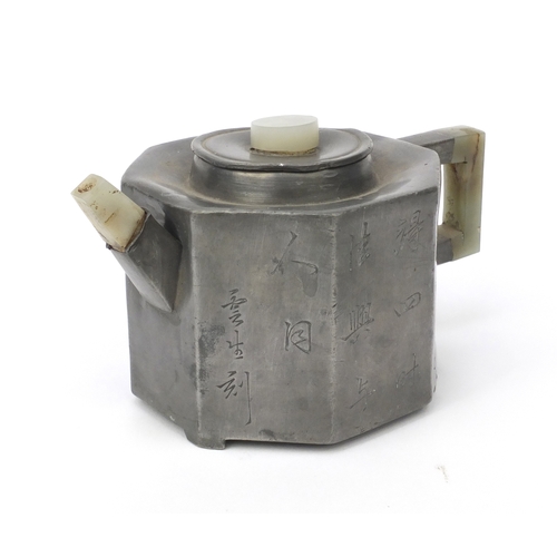 562 - Chinese pewter teapot with jade spout, knop and handle, one side of the pewter body with floral deco... 