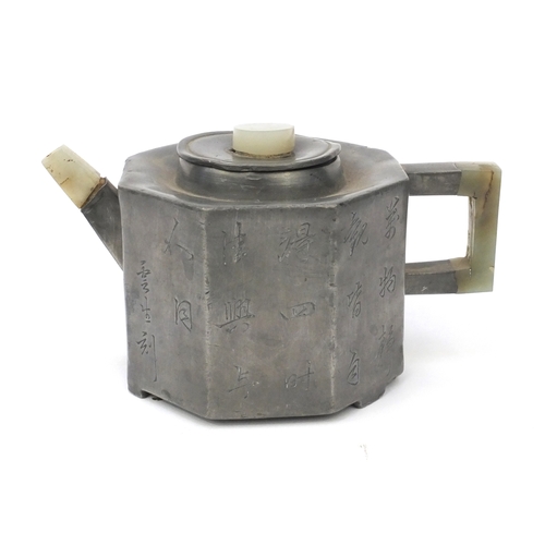 562 - Chinese pewter teapot with jade spout, knop and handle, one side of the pewter body with floral deco... 