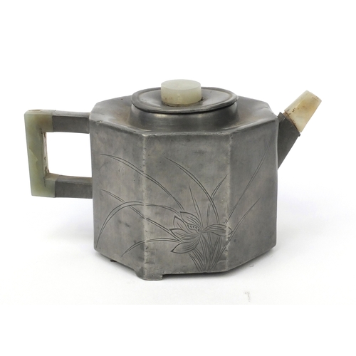 562 - Chinese pewter teapot with jade spout, knop and handle, one side of the pewter body with floral deco... 