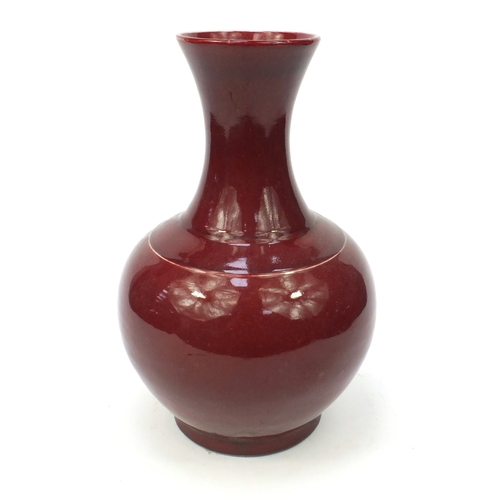 493 - Chinese porcelain Sang De Boeuf glazed vase, 33cm high