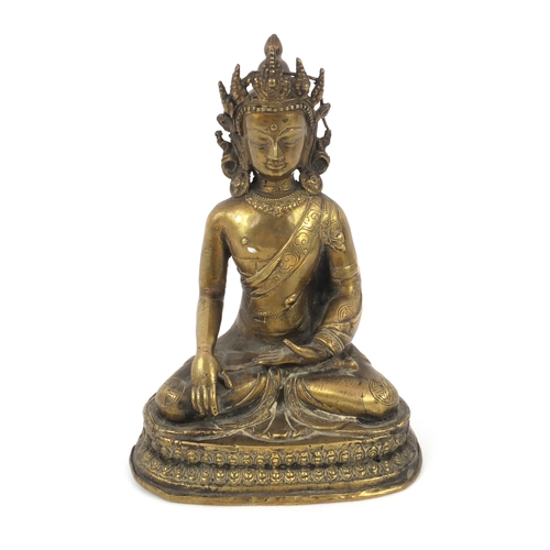 565 - Chinese Chino-Tibetan buddha sat in the lotus posistion, 21cm high