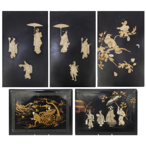 581 - Five Oriental lacquered panels with bone and mother of pearl relief decoration, including a pair of ... 