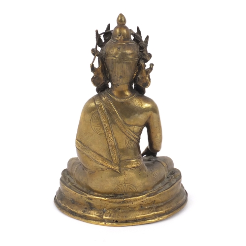 565 - Chinese Chino-Tibetan buddha sat in the lotus posistion, 21cm high