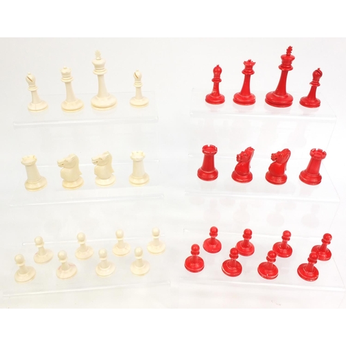 409 - Cantonese turned ivory half stained chess set, the tallest piece, 9cm high