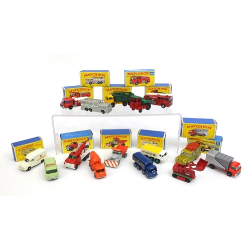 418 - Group of mostly boxed Matchbox series die cast vehicles, including fire pumper truck, greyhound bus,... 