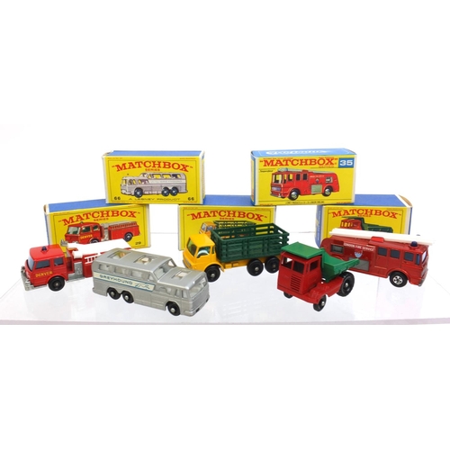 418 - Group of mostly boxed Matchbox series die cast vehicles, including fire pumper truck, greyhound bus,... 