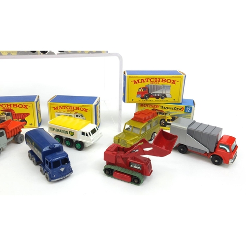 418 - Group of mostly boxed Matchbox series die cast vehicles, including fire pumper truck, greyhound bus,... 