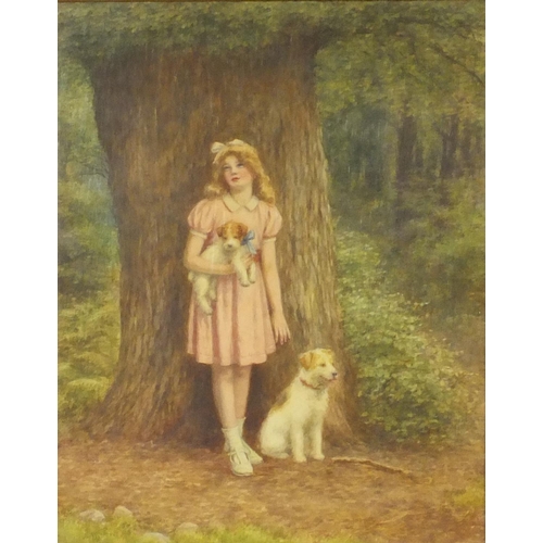 1009 - Watercolour view of a girl standing with her dogs beside a tree, bearing a signature M Howells, gilt... 