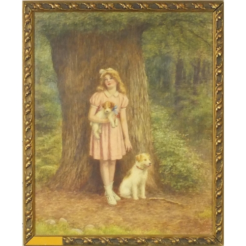 1009 - Watercolour view of a girl standing with her dogs beside a tree, bearing a signature M Howells, gilt... 