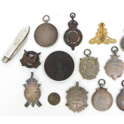 379 - Group of mostly silver Military interest jewels together with a silver bladed Mother of Pearl flanke... 