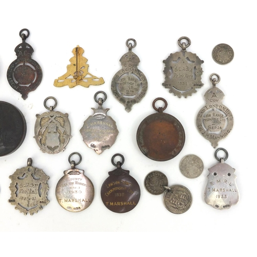 379 - Group of mostly silver Military interest jewels together with a silver bladed Mother of Pearl flanke... 