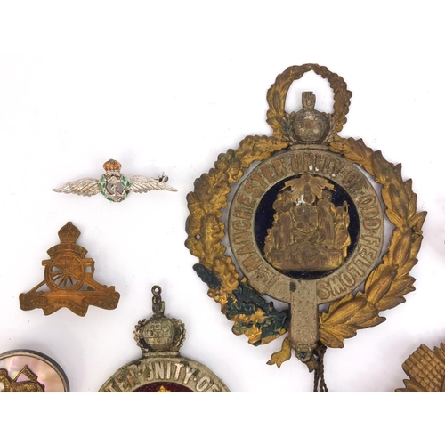 378 - Group of Military and Masonic interest badges and brooches, including a Mother of Pearl and enamel b... 