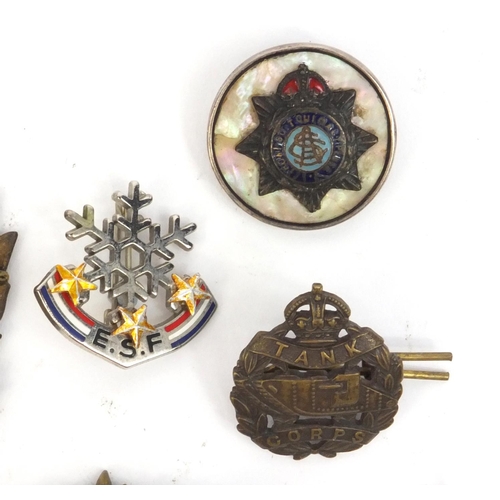 378 - Group of Military and Masonic interest badges and brooches, including a Mother of Pearl and enamel b... 