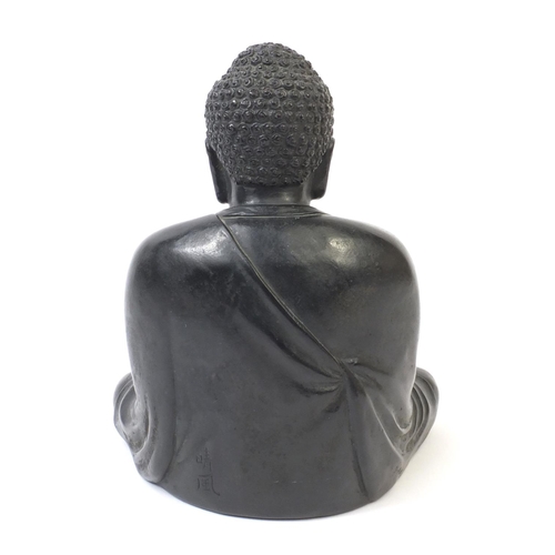 569 - Oriental Chinese bronze seated Buddha, character marks to the reverse, 20cm high