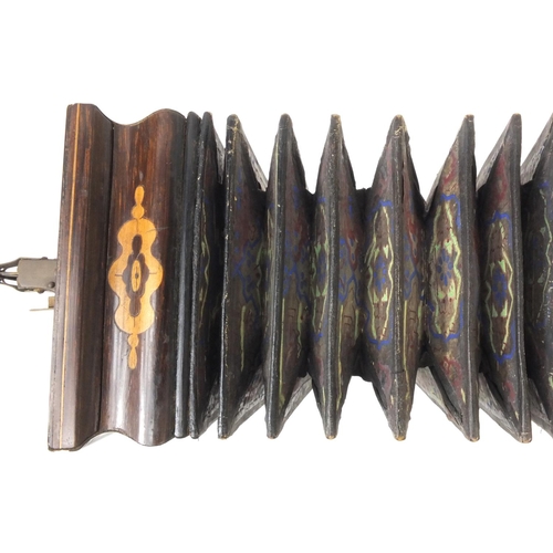 354 - Busson inlaid rosewood flutina with Mother of Pearl keys, impressed Bussin, 33cm wide