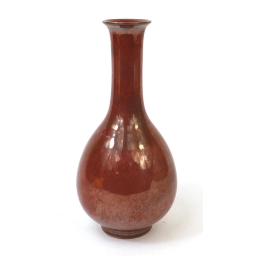 492 - Chinese porcelain Sang De Boeuf glazed bottle vase, character marks to the base, 26cm high