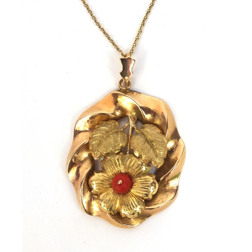 857 - Unmarked gold floral pendant on a 14ct gold necklace, the pendant 4cm long, approximate weight 5.4g