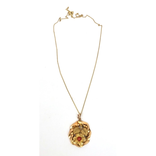 857 - Unmarked gold floral pendant on a 14ct gold necklace, the pendant 4cm long, approximate weight 5.4g