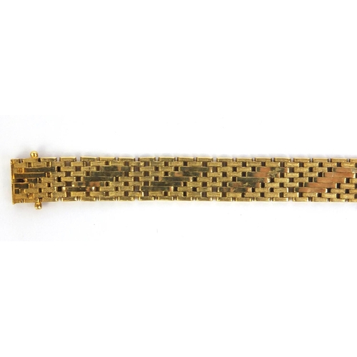 827 - 18ct gold flat link bracelet, 17cm long, approximate weight 21.0g