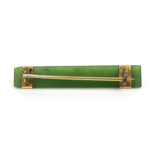 524 - Chinese unmarked gold green jade pendant and bar brooch, the brooch 4.5cm long, approximate weight 8... 