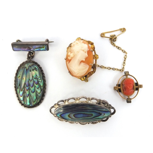 891 - Two silver abalone brooches, an unmarked gold coral cameo brooch and a gilt metal cameo brooch, the ... 