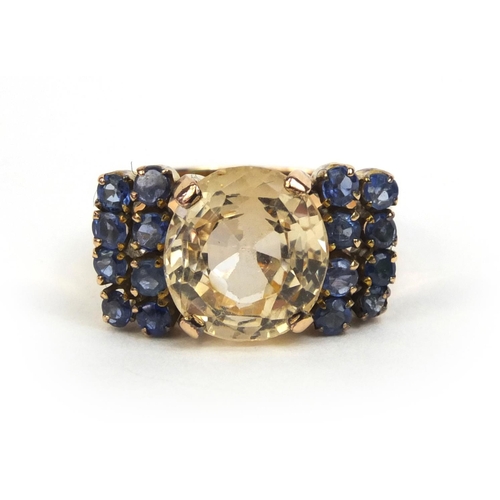 813 - Designer 14ct gold yellow and blue sapphire ring, size K, approximate weight 6.0g