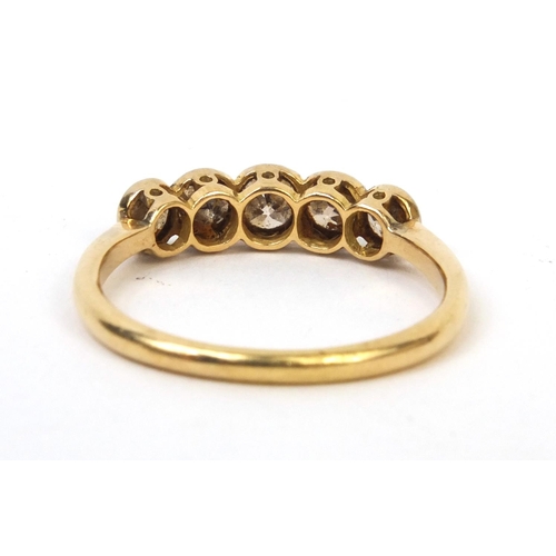 824 - 18ct gold diamond five stone ring, size S, approximate weight 2.7g