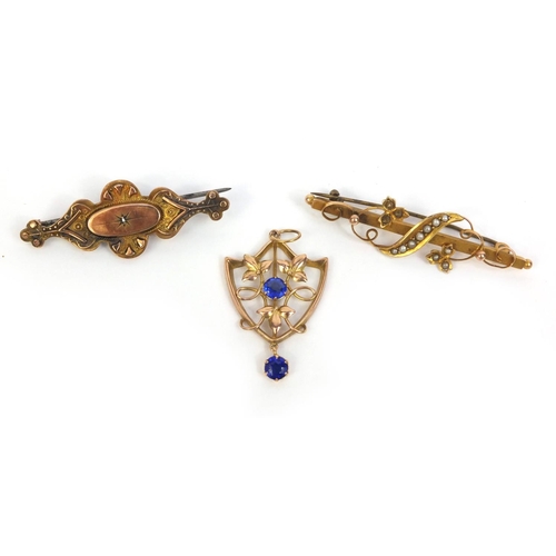 872 - Art Nouveau 9ct gold blue stone pendant and two Victorian 9ct gold brooches set with seed pearls and... 