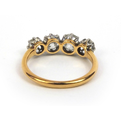 802 - Unmarked gold diamond four stone ring, size K, approximate weight 2.8g